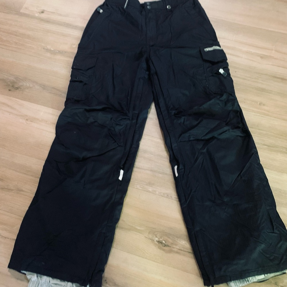 RipZone snowboarding Black Cargo Pants with Relaxed Fit and Wide Leg Opening.